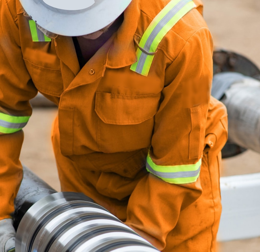 Field specialist handling a precision tubular connection